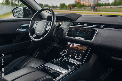 Modern car interior with the leather panel, and dashboard