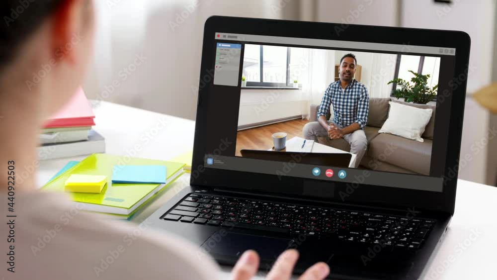 communication, technology and people concept - woman with laptop computer having video call with indian man at home communication, technology and people concept - woman with laptop computer having video call with indian man at home