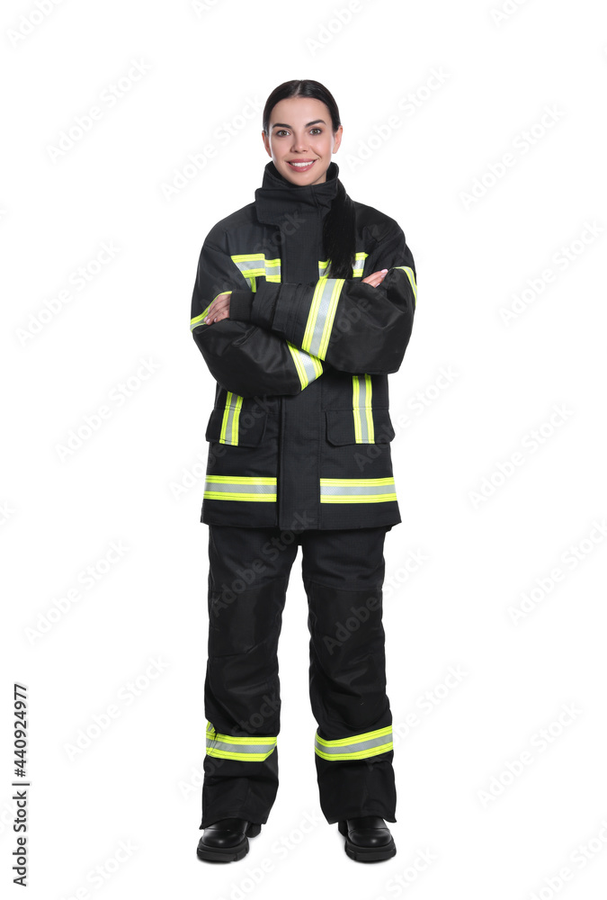 Full length portrait of firefighter in uniform on white background