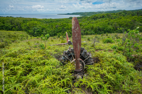 WW2 war ruin, broken Zero fighter on middle of the hill in Ngaremlengui state in Palau, Oceania photo