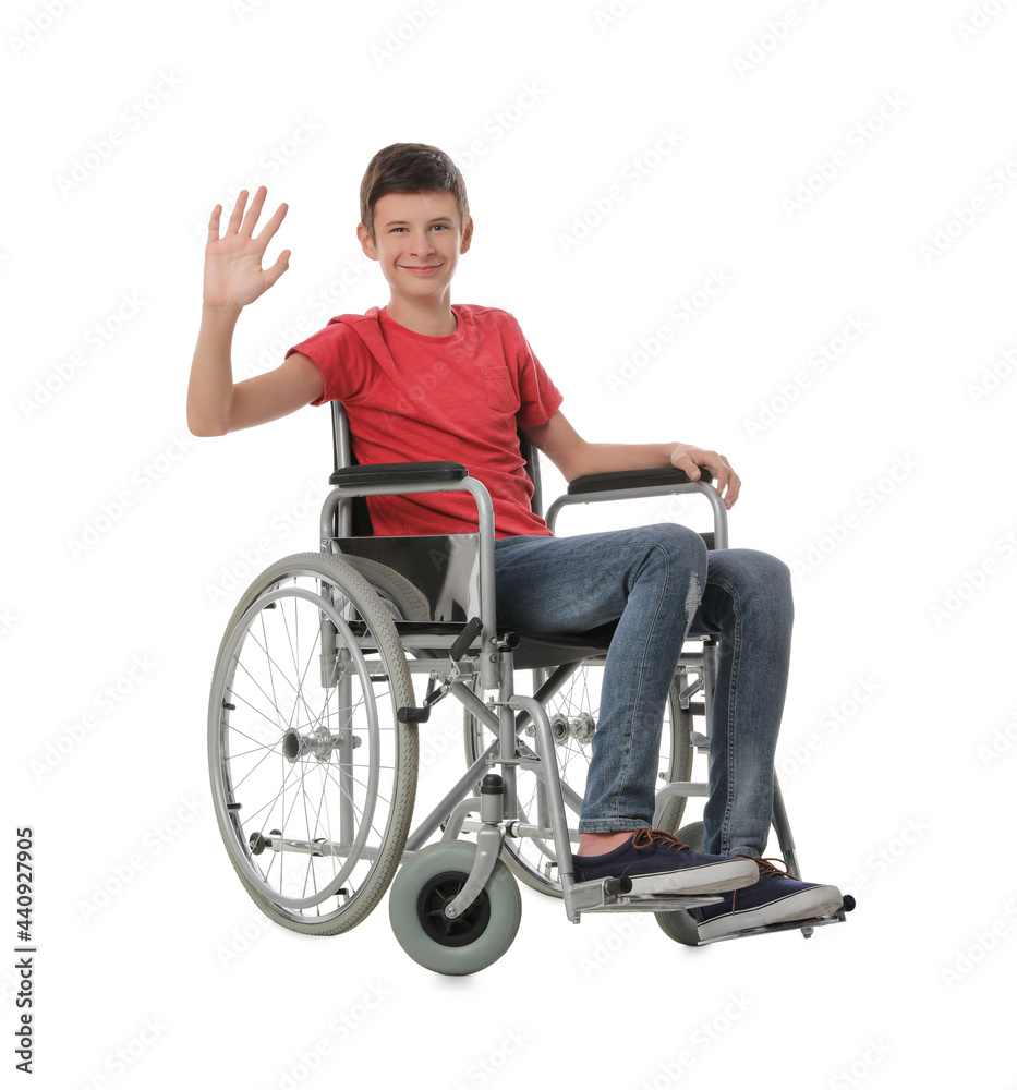 Teen boy in wheelchair on white background Teen boy in wheelchair on white background