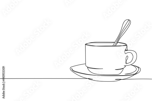 Continuous one line of cup with teaspoon in silhouette on a white background. Linear stylized.Minimalist.