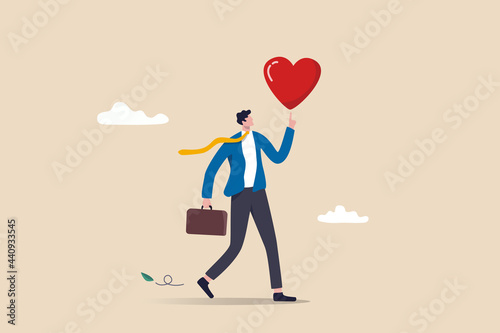 Work passion to motivate and inspire employee to achieve career success, love your job or happy and enjoy working dream job concept, happy businessman holding passionate heart shape walking to work. photo