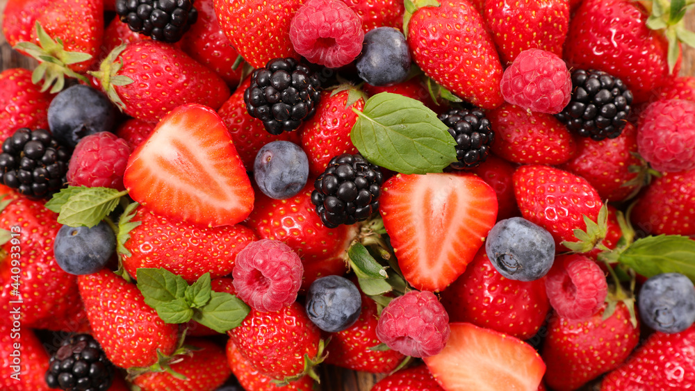 Fototapeta premium fresh berries fruits background assortment