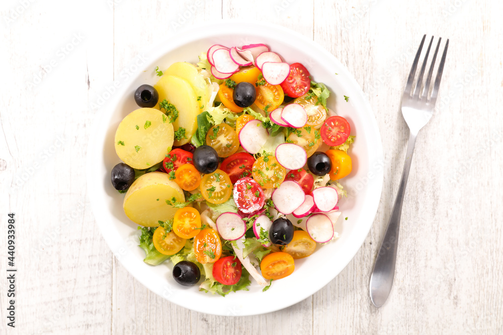 vegetable salad with potato, radish, tomato and olive vegetable salad with potato, radish, tomato and olive