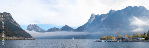 panorama landscape lake Traunsee, lakeside Ebensee with boathouses and harbor photo