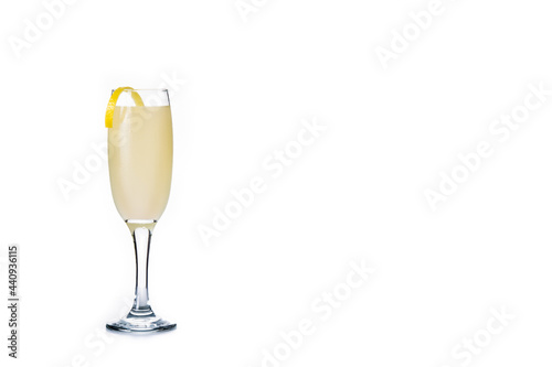 French 75 cocktail in glass isolated on white background. Copy space