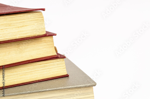 Stack of books on a white background.