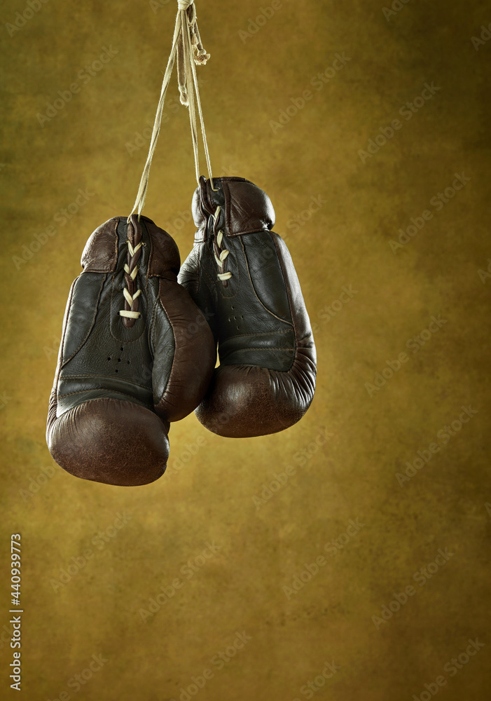 Boxing gloves hanging on a wall