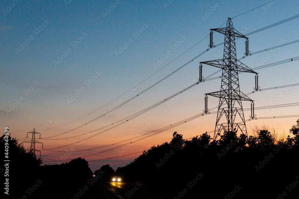 Electricity Power Pylons At Sunset