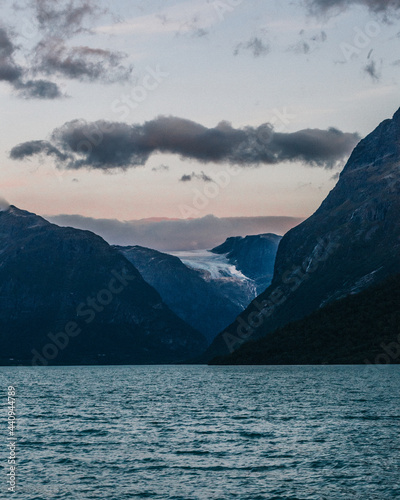 Lake and layered mountains