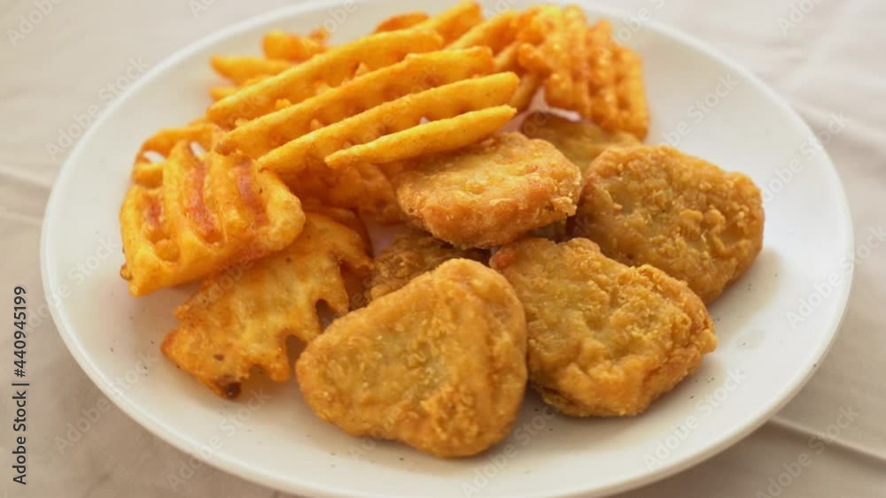 fried chicken nuggets with fried potatoes fried chicken nuggets with fried potatoes
