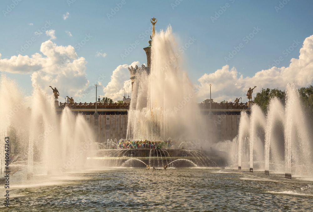Fototapeta premium Fountain in the VDNKh city park in Moscow on a summer day