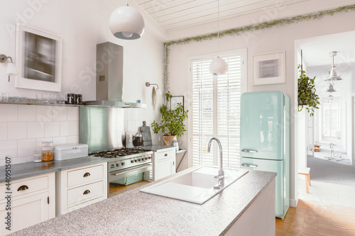 Bright kitchen interior with modern white furniture, pastel mint fridge and big floor to ceiling window