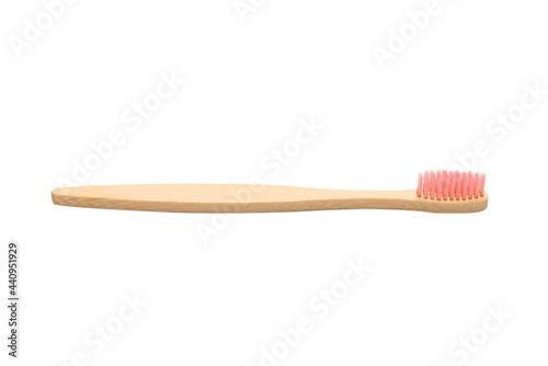 Bamboo toothbrush isolated on a white background.