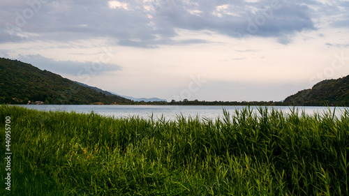 Lago di Mergozzo fotografato dall'omonimo comune al calare della sera. photo