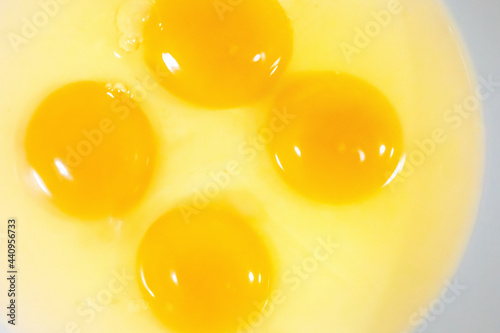 Raw eggs on white background.