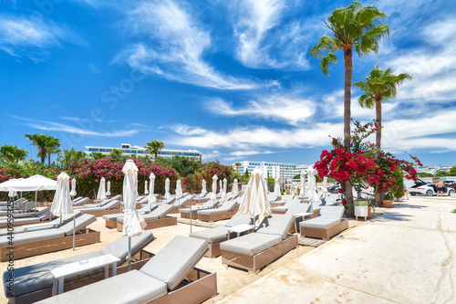 Empty sunbeds on the beach of Ayia Napa, Cyprus photo