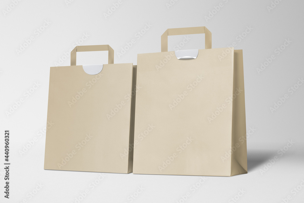 Paper shopping bags on gray background Paper shopping bags on gray background