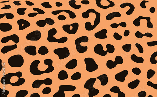 Fashionable leopard print. Vector illustration of safari texture with leopard, cheetah, or jaguar spots.