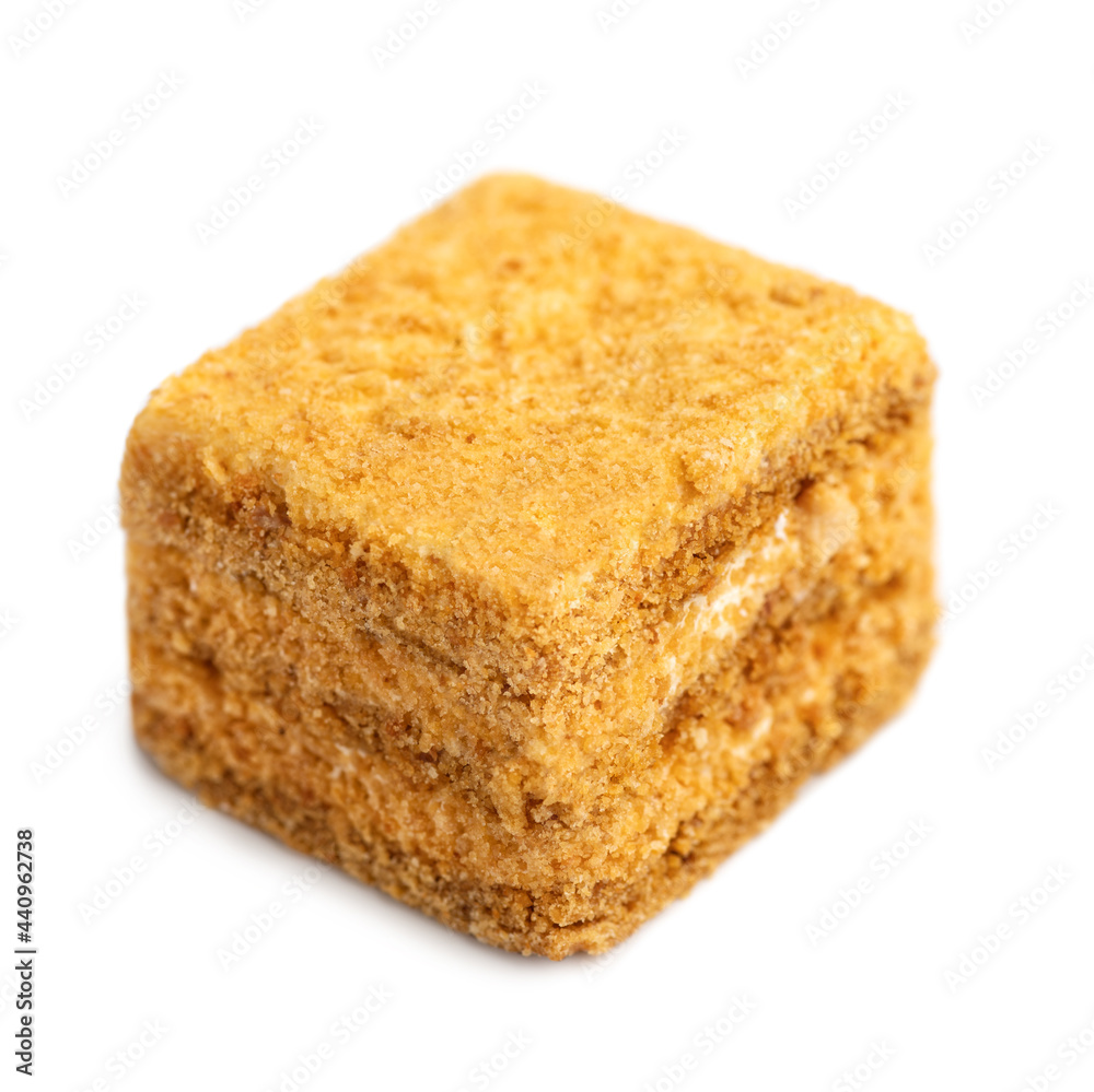 Mini cake honey cake. Medovik slice. Tasty dessert square cake