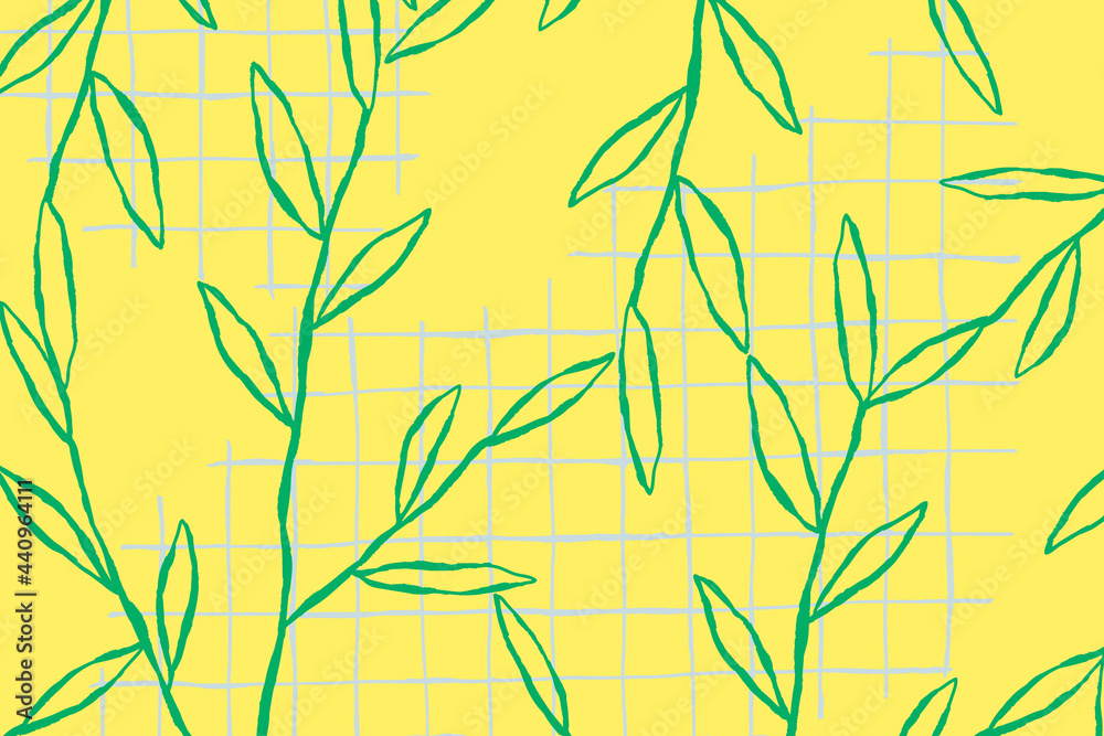 Green leaf pattern on yellow grid background Green leaf pattern on yellow grid background
