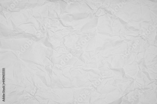 wrinkled white or gray paper texture background.
