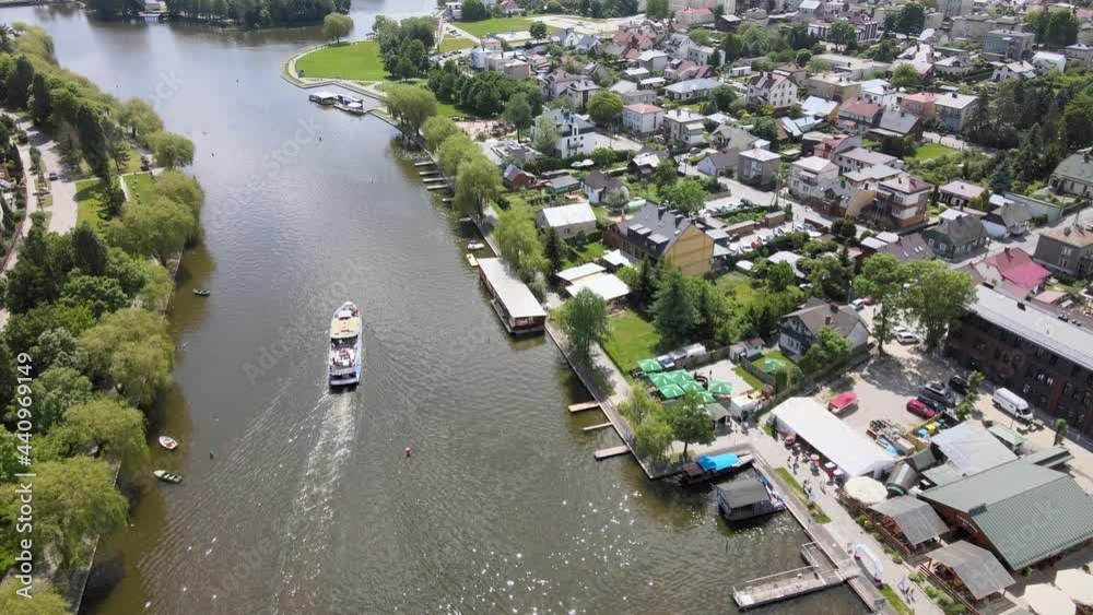 Augustów landscape from a bird's eye view.Top view of cruise ships on the Augustów canal.View of the city of Augustów from the drone. Augustów landscape from a bird's eye view.Top view of cruise ships on the Augustów canal.View of the city of Augustów from the drone.