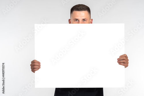 Man with white banner. He s...