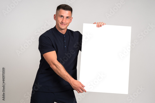 Businessman is holding bann...