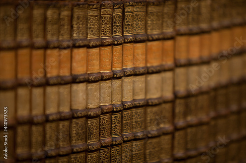 Old book, codex in a library. Reading is relaxing. Communication and knowledge before the internet.