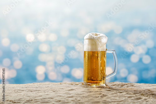 Cold beer on the seashore beach on a summer holiday day 