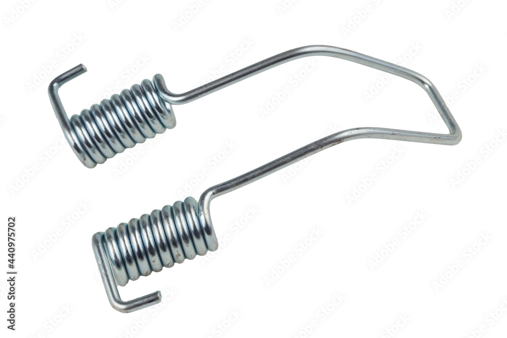 Truck brake pads spring. Spring of brake pads on a gray background. Spring. Truck brake pads spring. Spring of brake pads on a gray background. Spring.