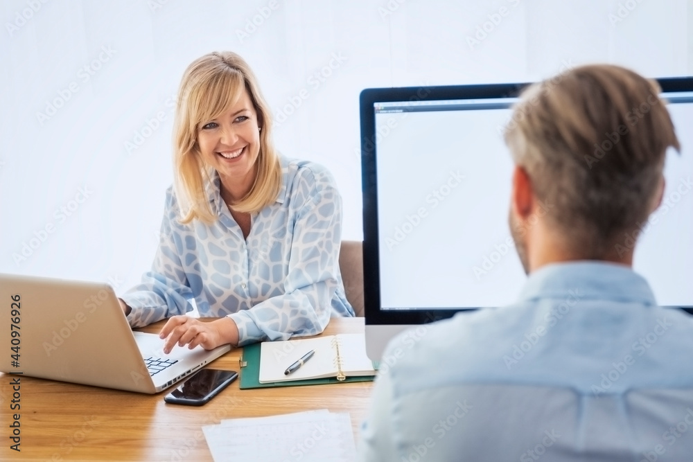 Group of business people working together at the office Group of business people working together at the office