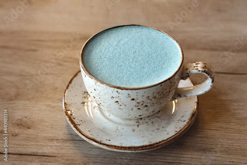 Blue Tea matcha Latte on wooden background