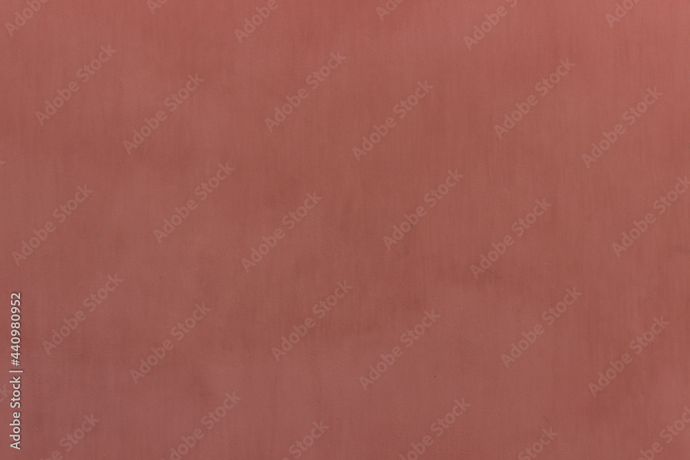 Fototapeta premium Pink concrete wall texture. Stains on paint