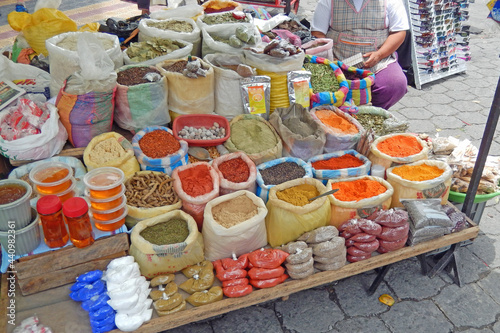 Spices, sweets and nuts for sale at the outdoor market in Otavalo, Ecuador.