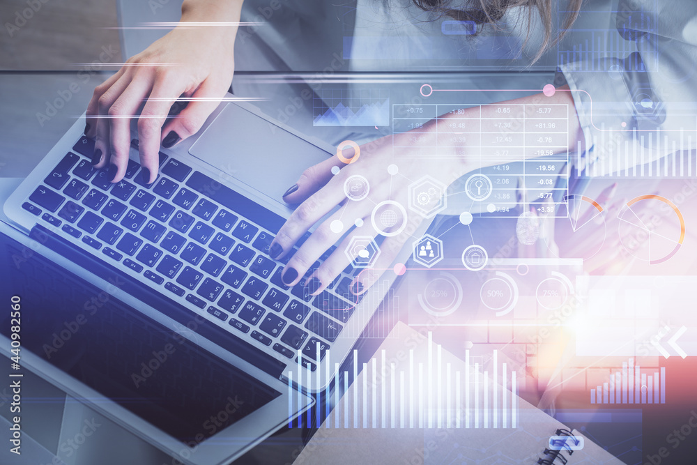Double exposure of woman hands working on computer and data theme hologram drawing. Tech concept. Double exposure of woman hands working on computer and data theme hologram drawing. Tech concept.