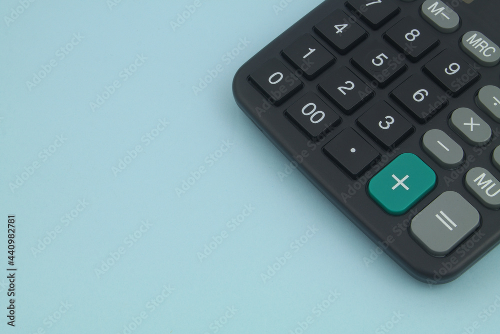 Calculator on blue background with space for text. Calculator on blue background with space for text.