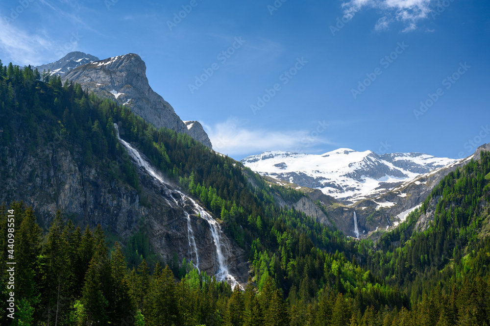 idyllic waterfalls in Lauenenvalley, Bernese Alps, Switzerland