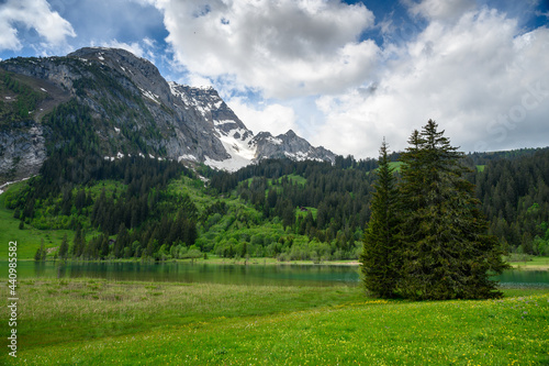 idyllic Lake Lauenensee in spring, Bernese Alps, Switzerland photo