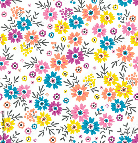 Cute floral pattern. Seamless vector pattern. Elegant template for fashion prints. Small colorful flowers for print. White background. Stock vector.