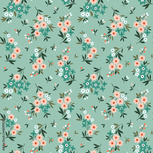 Trendy seamless vector floral pattern. Seamless print made of small coral flowers. Summer and spring motifs. Pale blue background. Stock vector illustration.