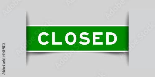 Label sticker green color in word close that inserted in gray background