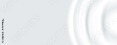 Drop falling into milk, lotion or paint top view