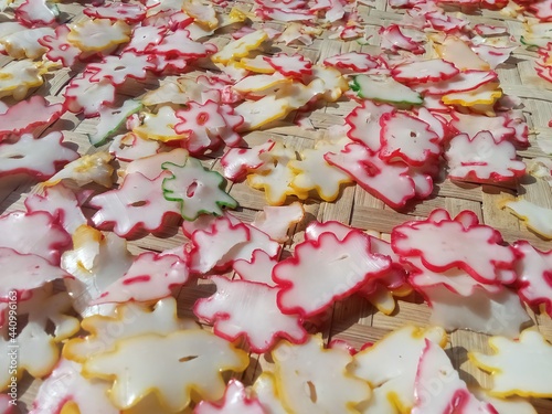 crackers that are being dried in the sun, Kerupuk or krupuk are snacks that are generally made from tapioca flour dough and come from Indonesia, sutable for background, texture, food themed web photo