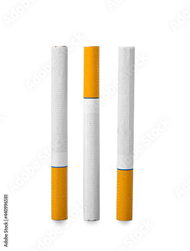 Whole cigarettes on white background