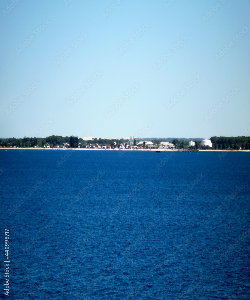 Beautiful view of the cost with trees and the blue sea Beautiful view of the cost with trees and the blue sea
