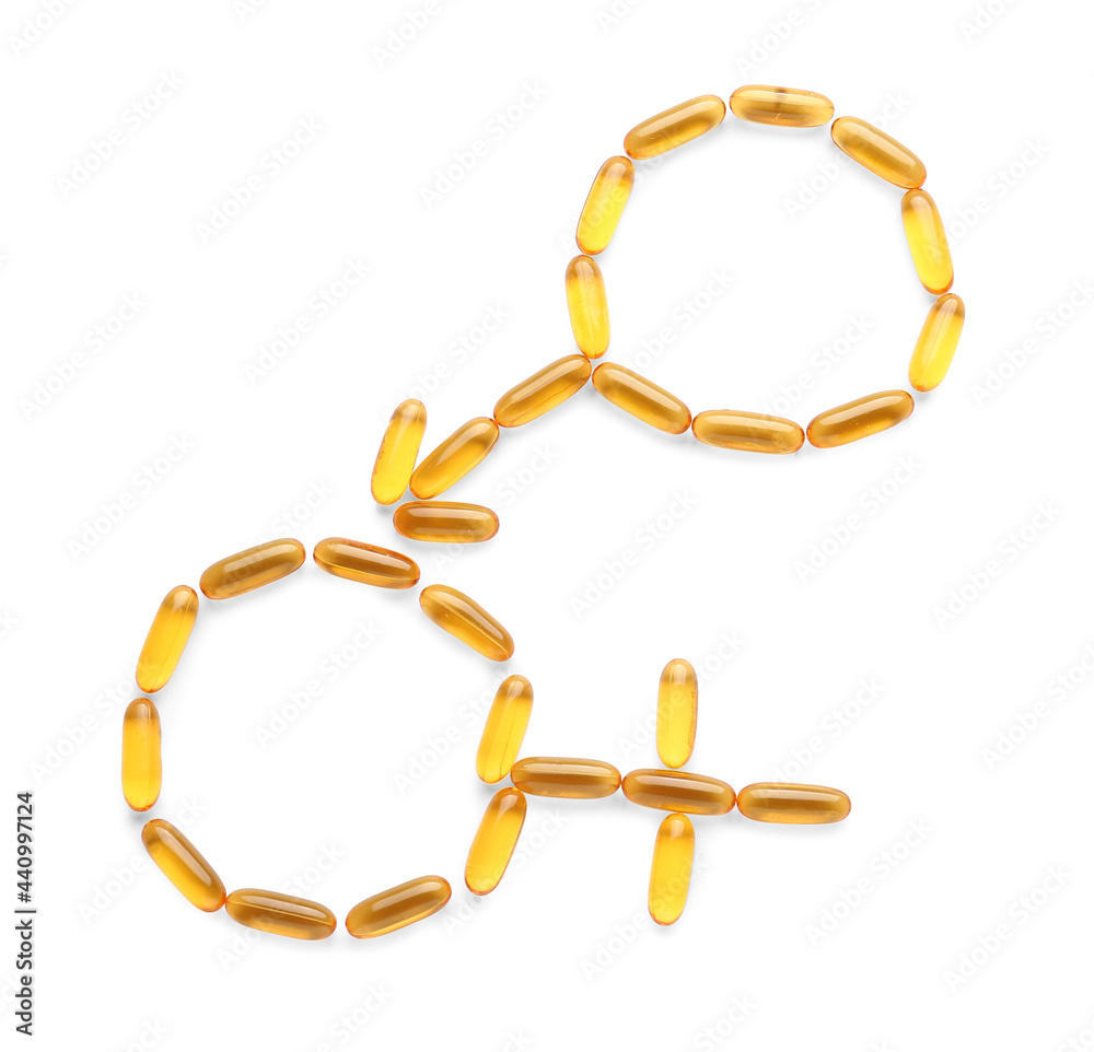 Gender symbols made of fish oil capsules on white background Gender symbols made of fish oil capsules on white background