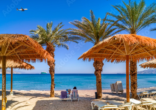 Morning on sandy beach in Eilat - famous tourist resort and recreation city in Israel